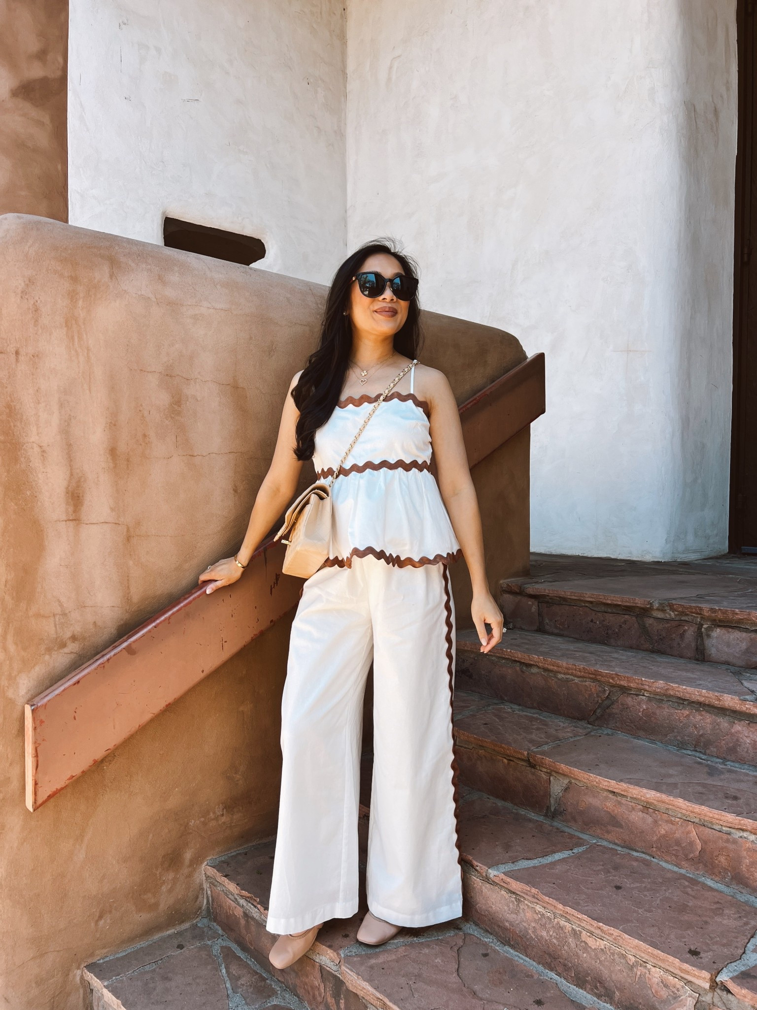 White and tan set that is perfect for vacations and more! So pretty on and I love the scallop trim. 100% cotton and the pants have an elasticized waistband. Use code HOANGKIM for 20% off! 

#LTKSummerEdit #LTKSeasonal #LTKStyleTip