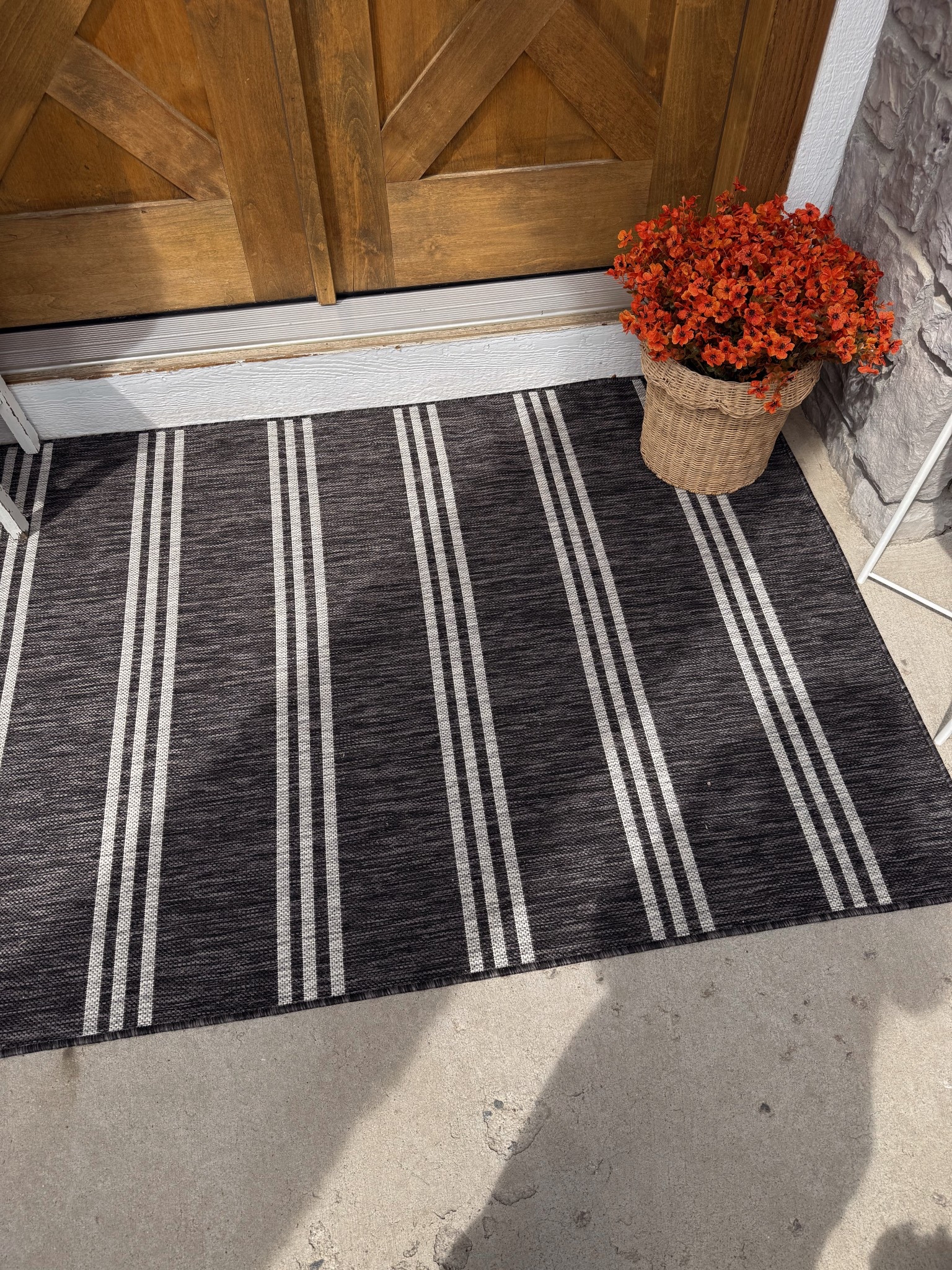 My new outdoor rug for my front porch. I now have this in 3 total colors because I love it so much! This one is black for fall and Halloween! 

#LTKSeasonal #LTKHome #LTKFindsUnder100