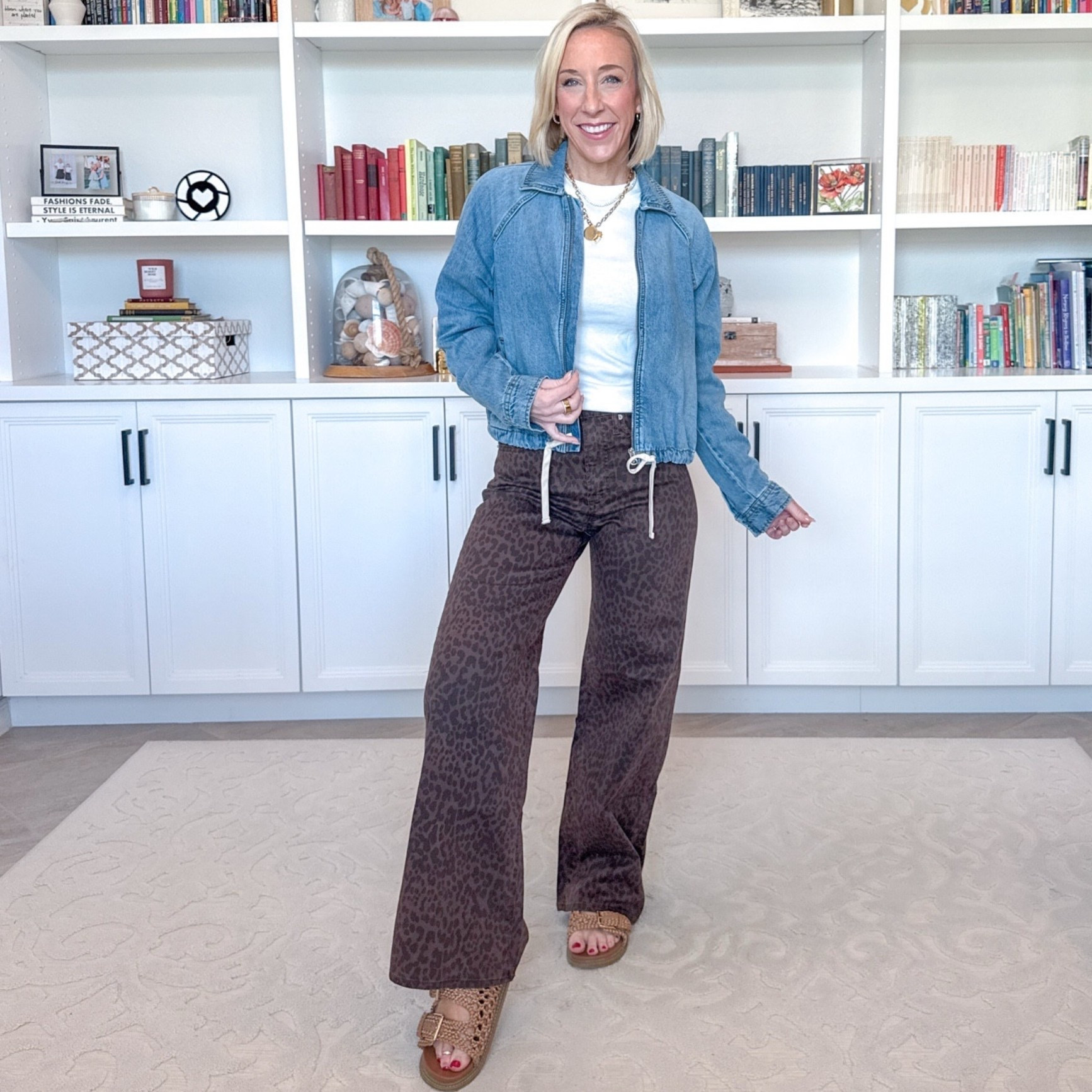 Leopard Jean - 1 pair - 6 easy outfits. High Rise Leopard Print Wide-Leg Jeans - I’m wearing a size 25, regular length, but I want to order the size 25 (wasn’t in store) and in the short length. Currently 60% off PLUS an extra 10% off in cart! (now $32.40!). Denim Bomber Jacket - size XS. $36. White Ribbed T-Shirt - size small. 

#LTKOver40#LTKSaleAlert 

 

#LTKootd