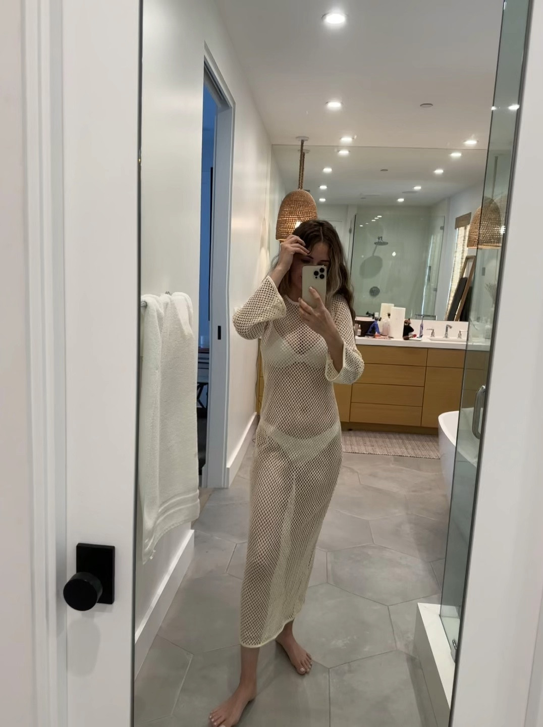 Classy ivory long sleeve cover up. 

Wearing small  

#LTKtravel #LTKSeasonal #LTKswim