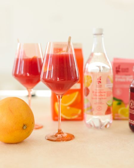 Make a Summer Sparkler to keep cool this season in a few easy steps 🍦

This is a fun, non-alcoholic refresher that the whole family (and kids) will love. Mix equal parts @target Good & Gather chilled cranberry juice and orange juice (or any other juices you love) along with 2 parts sparkling water of choice. Peel grapefruit zest, twist and drop in and add an optional popsicle to your glass to keep things cool! 

#LTKhome