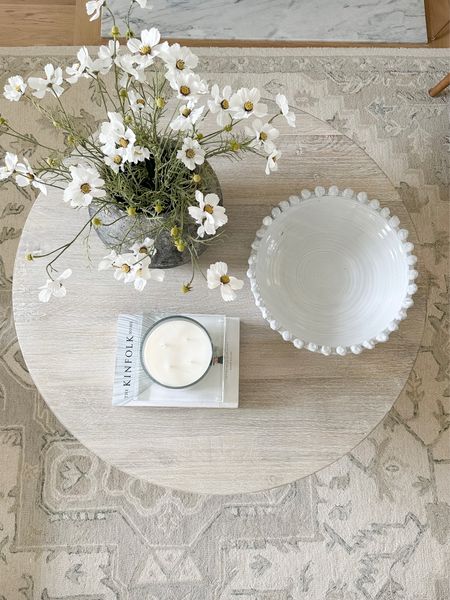 Round coffee table, neutral beige white and ivory living room rug, coffee table decor, dark gray vase with faux flowers (I used 5 stems) 

#LTKstyletip #LTKsalealert #LTKhome