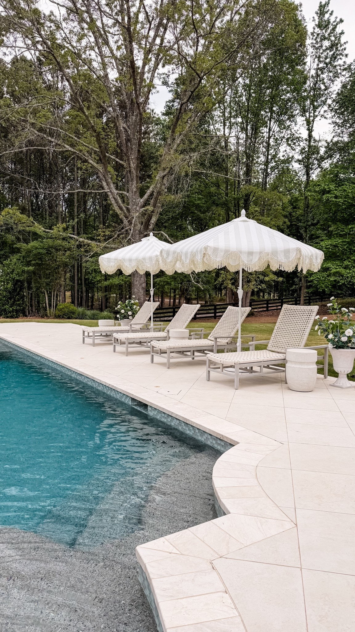 Love these gorgeous umbrellas from @Wayfair they have totally transformed my pool area! It just added so much personality. These umbrellas come in several different color options! #ad #WayfairPartner #WishYouWereHere #Outdoor #Wayfair