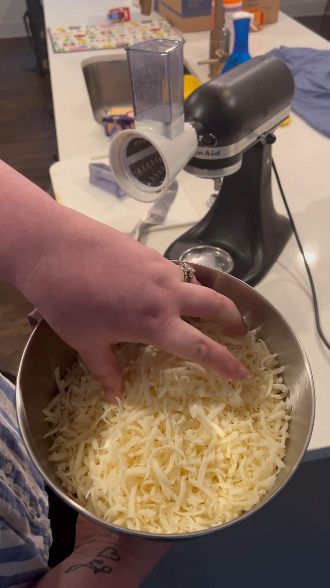 My new favorite hobby is shredding my own cheese! This attachment for my KitchenAid mixer that shreds cheese can also shred vegetables, butter, meat, etc. it’s affordable and a fun home/kitchen find  

#LTKHome #LTKVideo
