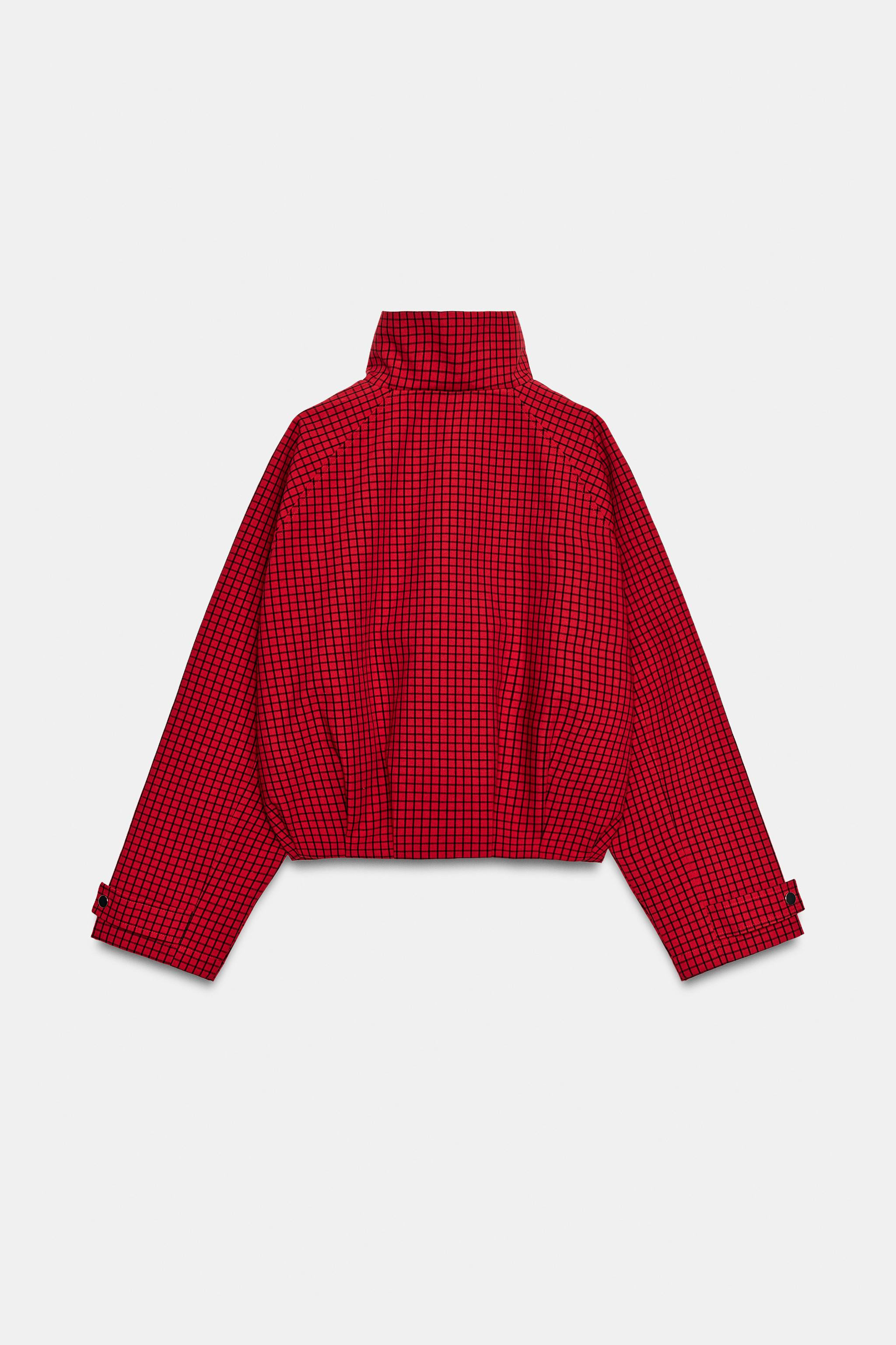 Bomber-style jacket with a high collar and long sleeves. Adjustable cuffs with snap-button tabs. ... | Zara US