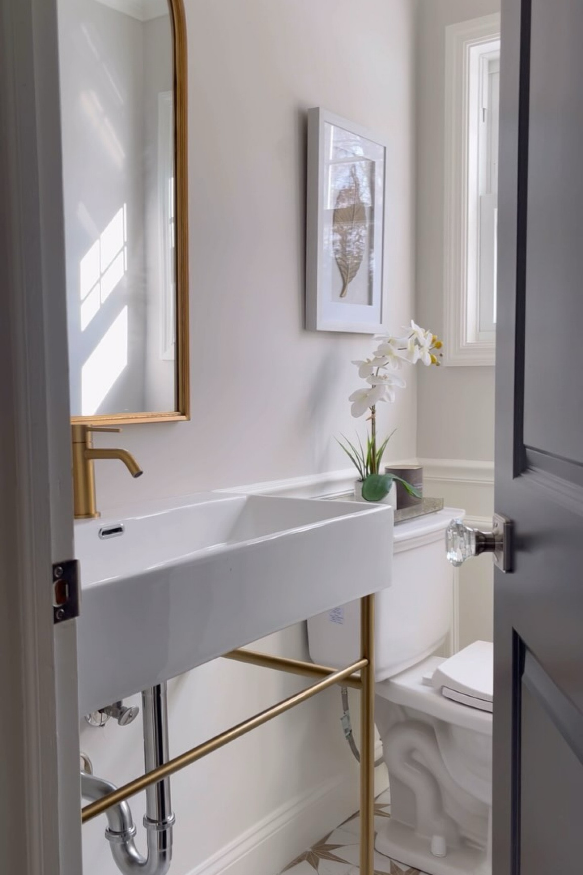 Love this Powder Room - It’s small but sweet with this space saving console vanity and brass accents 💛

#LTKVideo #LTKHome #LTKStyleTip