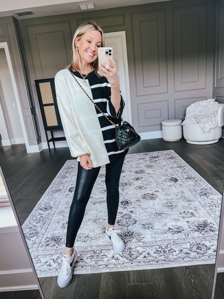 My outfit of the day-Free People look alike top from Amazon wearing M, faux leather leggings from Amazon & the cutest crossbody! #founditonamazon 

#LTKSeasonal #LTKstyletip #LTKfindsunder50
