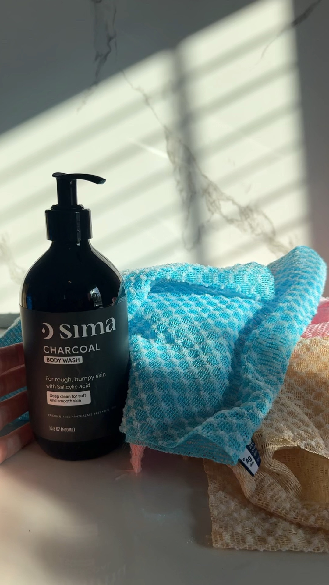 My secret to smoother skin ✨ This exfoliating shower towel removes dead skin and leaves my skin feeling fresh, clean, and glowing every shower.