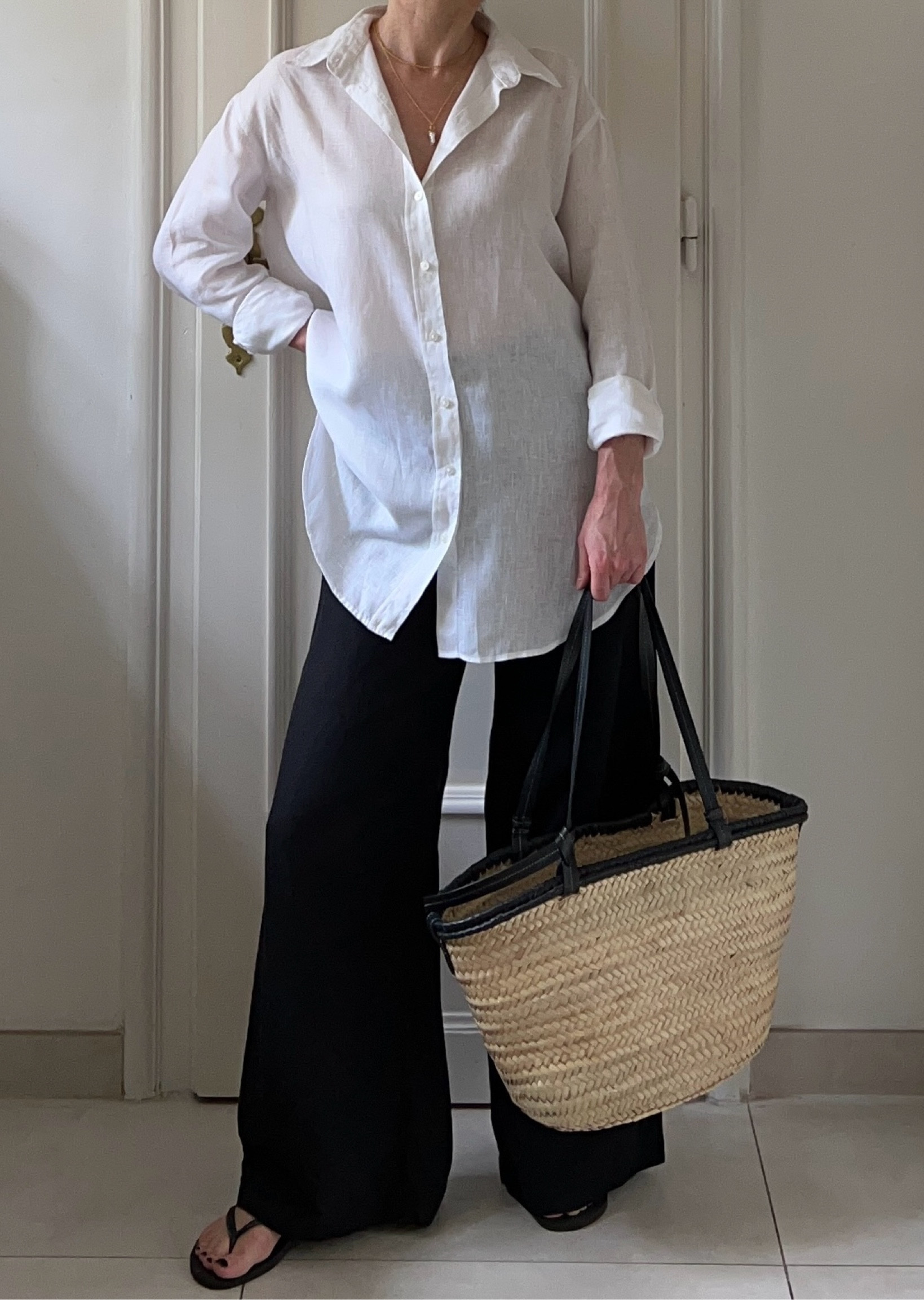 Summer outfit, linen outfit, holiday outfit, linen shirt, white linen shirt, white shirt, oversized shirt, oversized linen shiry, wide-leg trousers, black trousers, black pants, floaty trousers, flip flops, Havaianas flip flops, basket bag, straw bag, raffia bag

#LTKsummer #LTKstyletip #LTKbag