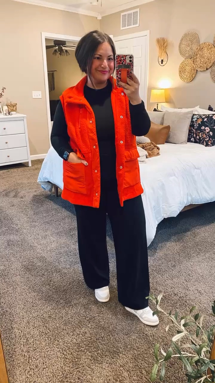 Cozy vibes and festive feels! ❤️ Loving this red fleece vest from Amazon that adds the perfect pop to my winter wardrobe. Pairing it with my favorite layers keeps me snug and stylish!
sneakers: fit true to size // wearing a 5
pants: fit true to size // wearing a short medium
long sleeve: fits true to size // wearing a medium
vest: fits true to size // wearing a large 

 #LTKHoliday #LTKStyleTip #LTKWorkwear
