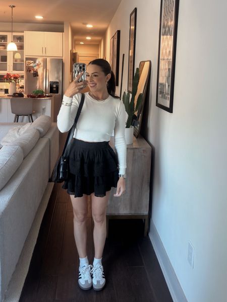 White cropped long sleeve, black ruffle skirt, adidas sambas outfit 

#LTKSpringSale #LTKshoecrush