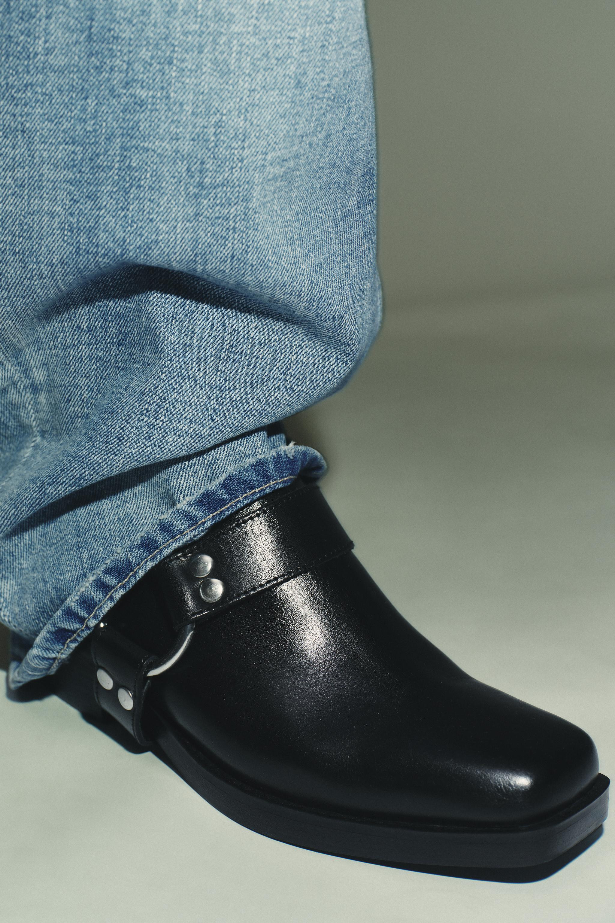 DescriptionCompositionMeasurementsModel height: 178 cmLeather clogs. Strap with metal studs and r... | Zara AU