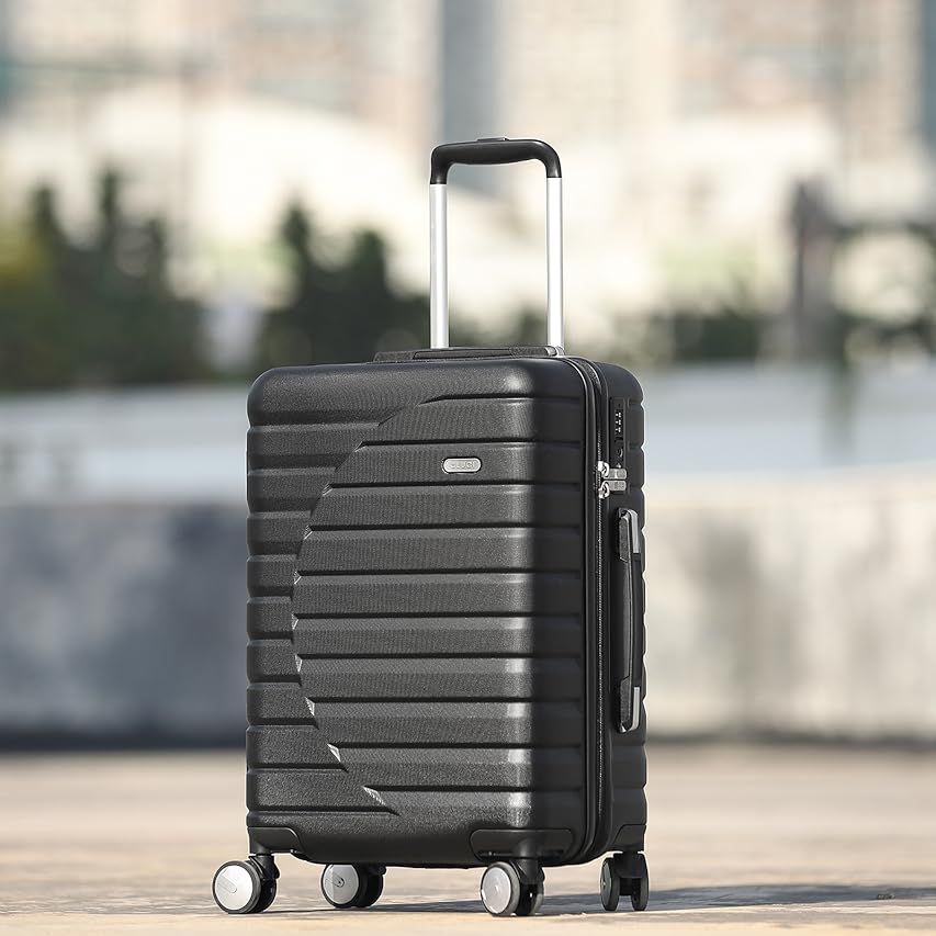 Wrangler 20" Spinner Carry-On Luggage, Black | Amazon (US)