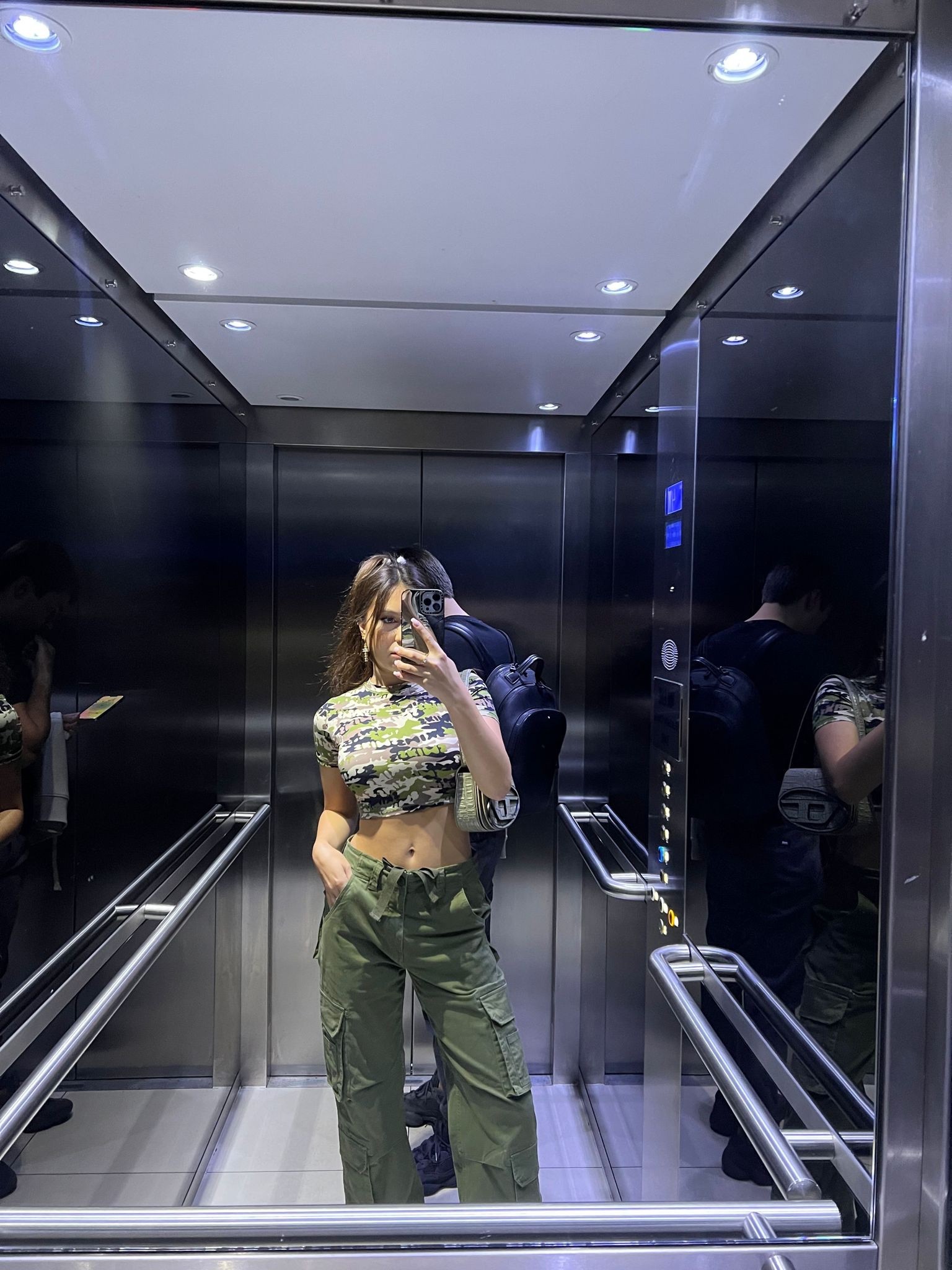 Crop top, army baby tee, fitted t-shirt, wide leg cargo pants, green shoulder bag, metallic croc bag, PLT, skims 

#LTKSeasonal #LTKstyletip #LTKeurope