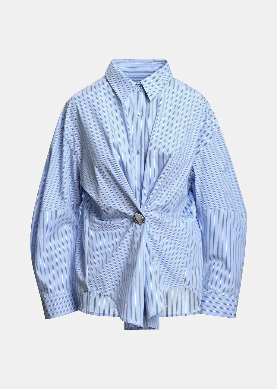 Light blue, off-white and black oversized striped shirt with separate brooch | Essentiel Antwerp ... | Essentiel Antwerp