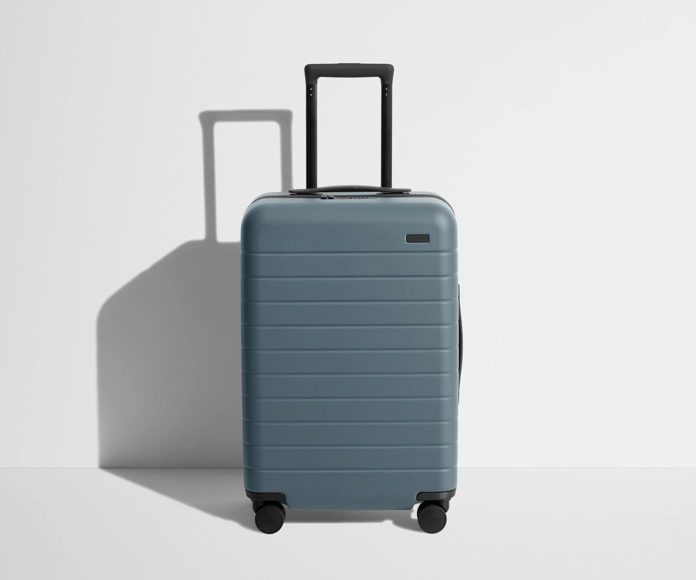 Shop The Bigger Carry-On suitcase in Coast Blue | Away: Built for modern travel | Away