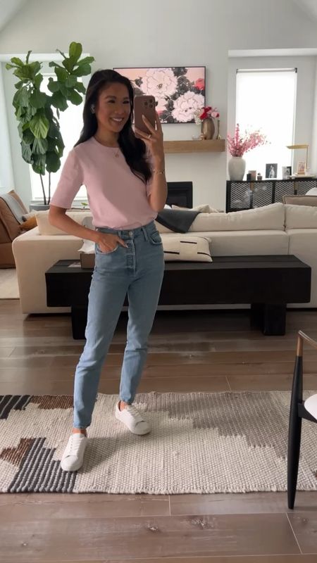 Spring outfit with pink knit top paired with straight jeans and white leather sneakers. Wearing size 24 in the jeans since it runs larger. Jeans are 20% off with code SPRING20! Linking different washes of the jeans that are part of the sale  

#LTKsalealert #LTKSeasonal #LTKstyletip
