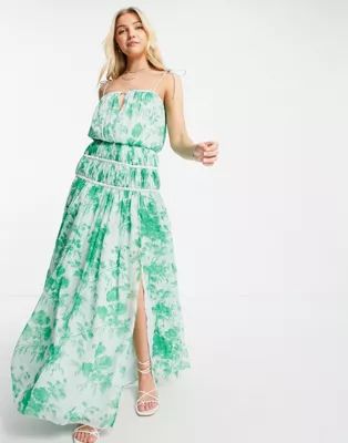 ASOS DESIGN strappy maxi dress with ruched channel detail and tie straps in green floral | ASOS (Global)