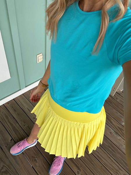 In love with this tennis outfit combo! Yellow tennis skirt and aqua tennis shirt. I get the largest size in the Athleta girls top, and it’s perfect! 

#LTKFindsUnder50 #LTKActive #LTKStyleTip