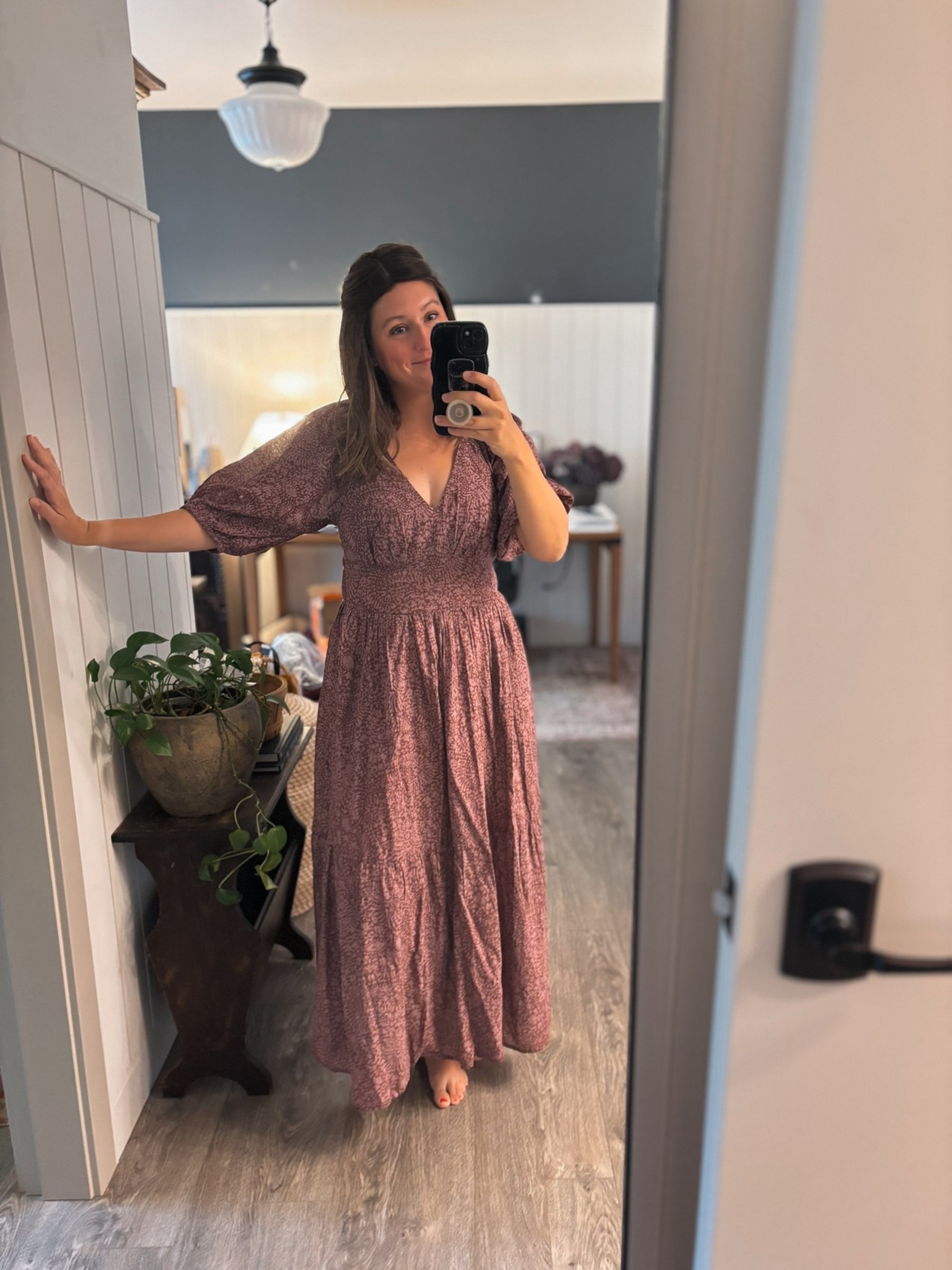 Target fashion find 🎯 I’m going to be honest — I totally disagree with the reviews on this dress. The Universal Thread Puff Elbow Sleeve Maxi A-Line Dress in mauve from Target (which is the version I’m wearing) gets low ratings, but I absolutely love it. The elbow-length puff sleeves give a bit of drama, the shirred bodice and back-elastic waist make it flattering, and the tiered maxi skirt really flows in that effortless, fashion-forward way. 
What I’m loving: this dress feels like the perfect mix of elevated casual, minimalist style, and comfortable everyday wearable. You can pair it with boots for a fall look, but you could definitely dress it up with heels or layer a jacket over it for cooler nights. The cotton-viscose fabric blend gives it movement, the v-neck line is subtle and flattering, and the tiered skirt gives just enough shape without feeling stiff. I’m wearing it to a wedding in the new year! 
If you’re looking for a maxi dress that gives you real style without feeling like you’re trying too hard, this is a win for me  

#LTKootd #LTKStyleTip #LTKWedding