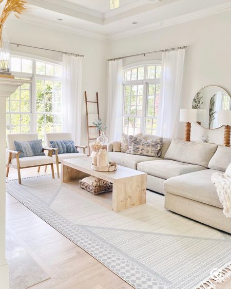 The sofa is a performance fabric in "taft cement" - super durable (looked amazing after 5 years with heavy use by toddlers and fam). The rug is 9'×12' and the white curtains are 104" long.#LTKFind 