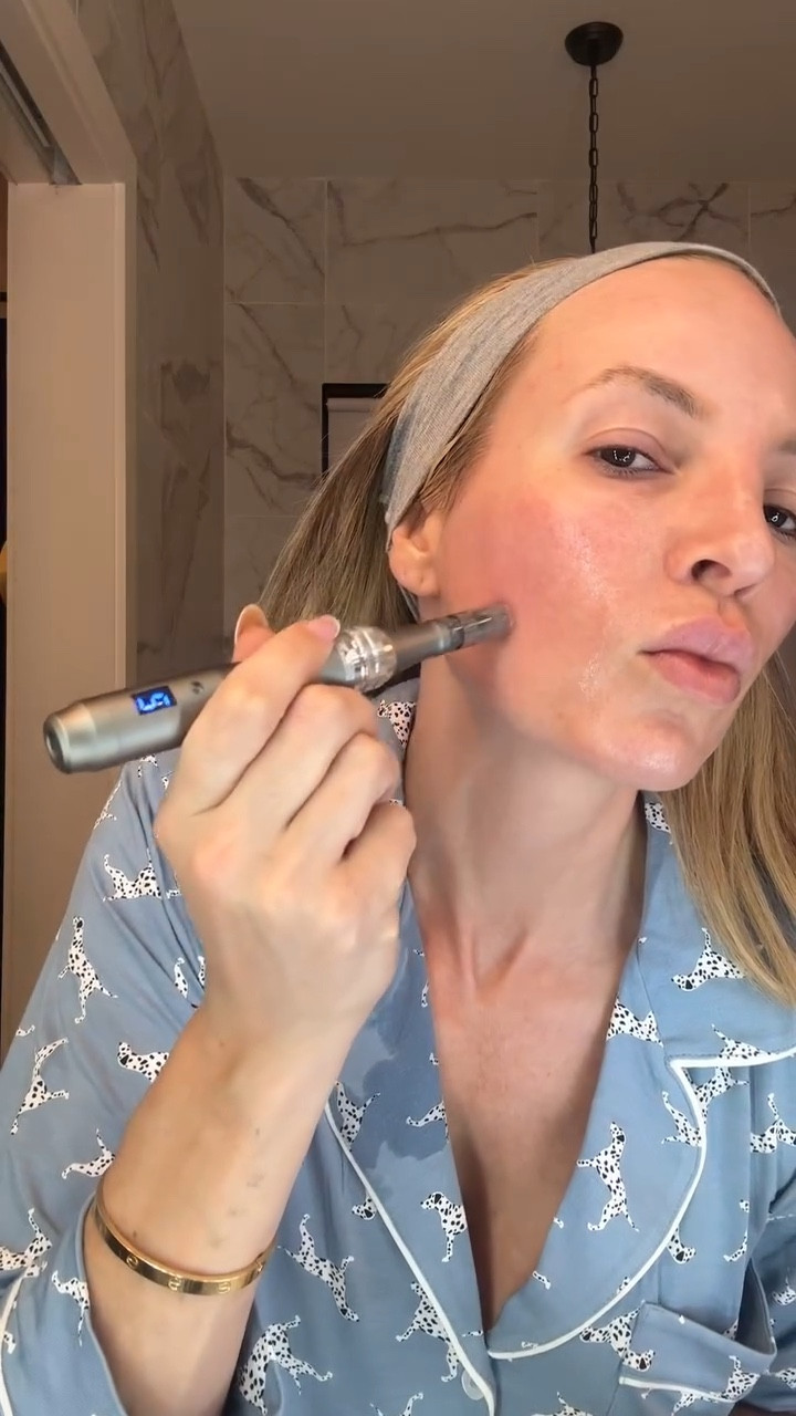 To begin, my microneedler is Dr. Pen m8 but there are a lot of websites that claim to be Dr. Pen so I linked another one from Derm store that looks very close to mine. 
1. First I prep my skin by make sure it is totally clean. You do not want to be needling your skin with traces of makeup or oil on your skin. I finish with wiping with rubbing alcohol to make sure it’s completely clean. (I don’t use numbing cream but if you want to, then do this now but make sure to completely clean of off after)
2. I always use a brand new cartridge each time I microneedle.
3. I start with areas that hurt less like my cheeks and chin. I use a 2.0 depth and 5 speed but I have been doing this for a while. I use the Biopelle growth factors for slip and work in small sections going on circular motions. I will go over the same area a couple times then move on.
4. For the forehead and eye area, the skin is thing and there’s not much fat so it will hurt more and you need to lower the depth. I do .75 for depth and 5 speed. 
(If the slip dries up too quickly I spray the glycerin rose water in that section.)
5. Now for my body I will do 2.0-2.5 depth with a 5 speed.
6. When I’m done I open a new biopelle ampoule and pat it on the skin. Biopelle is great to use with microneedling because its growth factor-rich formula accelerates skin repair, boosts collagen, and enhances overall results by deeply nourishing freshly treated skin.
7. Then I apply the OneSkin peptide (the eye cream has the highest concentration of the peptide OS-01. This peptide supports cellular repair, boosts collagen, and slows skin aging at the source. 
8. Next is red light. Red light after microneedling speeds up healing, reduces inflammation, and boosts collagen for even better skin-rejuvenating results.
9. Lastly I sleep with this collagen mask on. Sleeping with a collagen mask after microneedling helps deeply hydrate and replenish the skin while maximizing collagen absorption during its most active repair phase overnight. I’ve used many, even significantly more expensive ones but I always go back to this one.

#LTKOver40 #LTKBeauty #LTKWatchNow