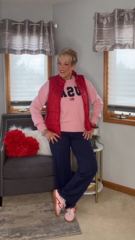 Wide leg yoga pants
USA sweater 
Red puffy vest
Pink and red sneakers
Ruffled socks 