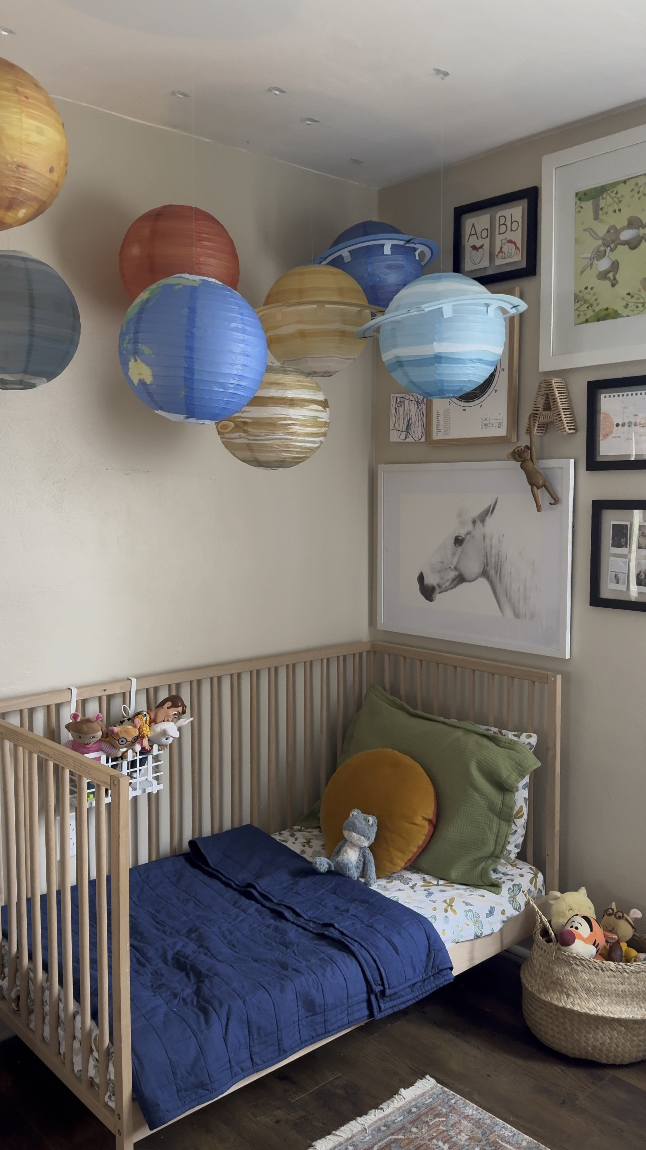For the planet obsessed toddlers 🥹 solar system paper lanterns!! Hung at different heights with fishing line and command hooks 🪐🌎💫☄️

#LTKHome #LTKKids #LTKFamily