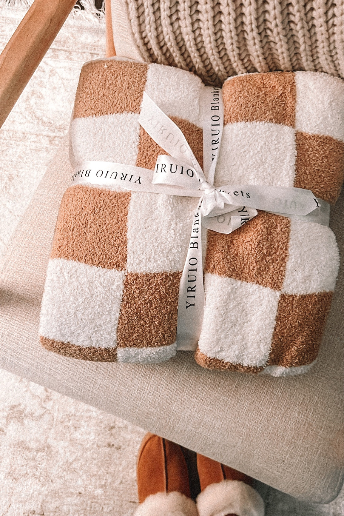 Amazon checkered blanket. This is the smaller of the 2 sizes. Color is burnt orange  