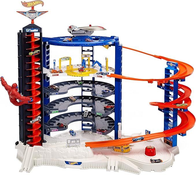 Hot Wheels Track Set with 4 1:64 Scale Toy Cars, Over 3-Feet Tall Garage with Motorized Gorilla, ... | Amazon (US)