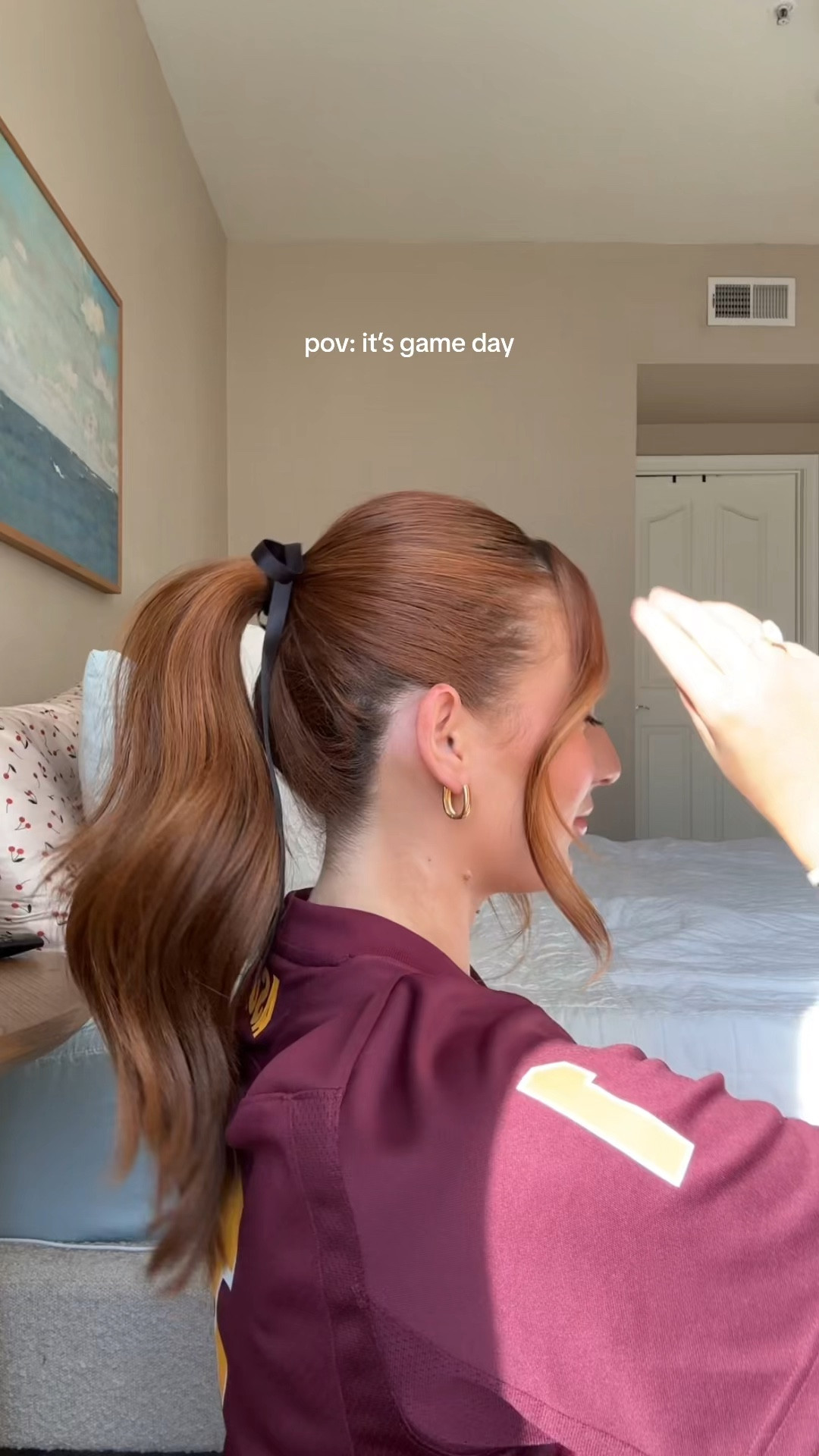 Easy game day ponytail with a ribbon  