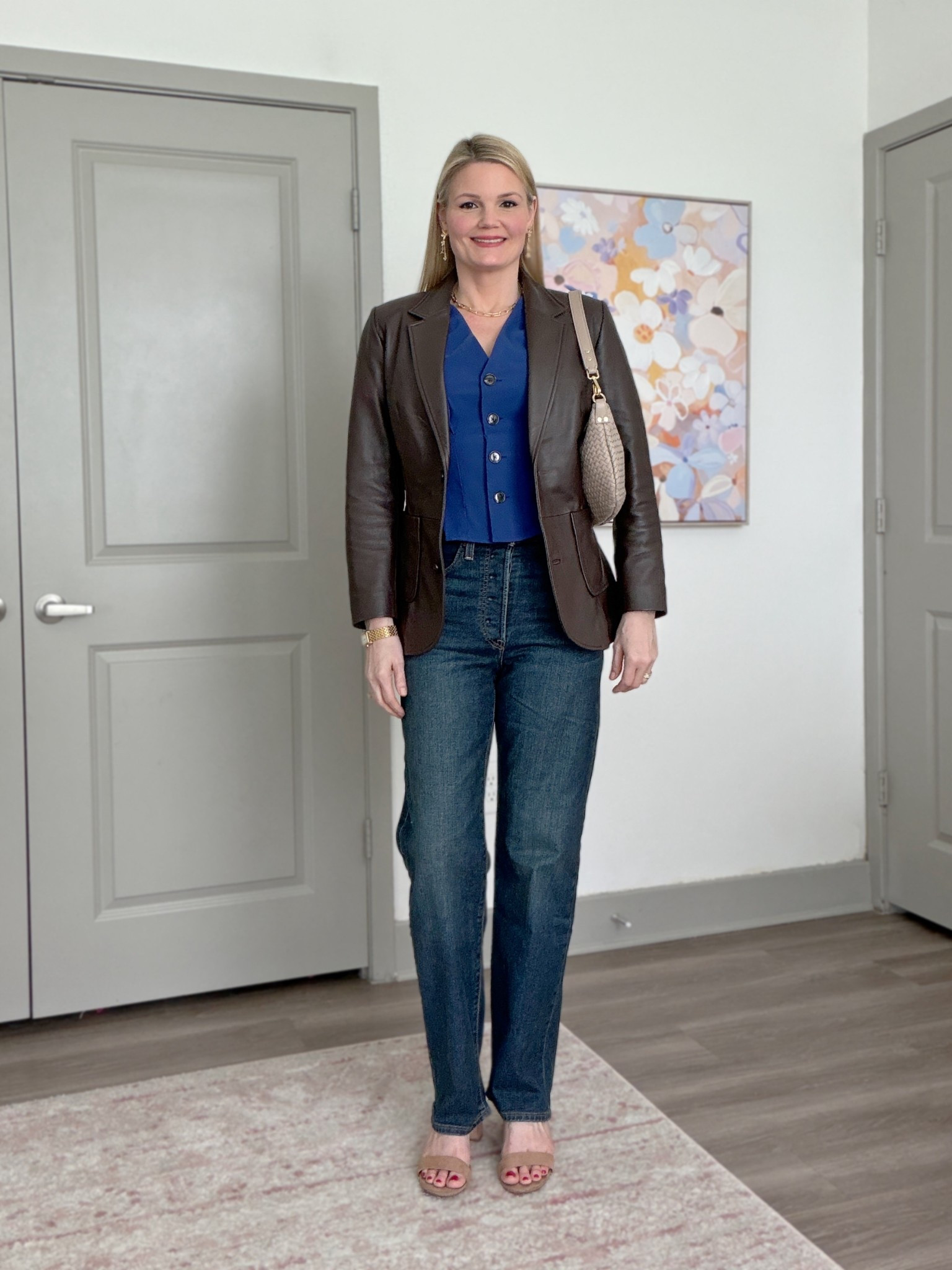 Elevated casual outfit! Button up blouse runs a little snug in the chest- consider sizing up one. Leather blazer fits true to size and is fabulous! Wearing the small. Jeans run about a size big- I’m in the 27 (4). Leather woven shoulder bag comes with crossbody strap  

#LTKSeasonal #LTKTall #LTKOver40