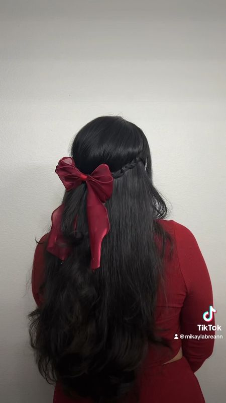 This super easy and quick hairstyle is so stunning. I did some simple braids that I pushed back and tied together and styled with a bow. Its so fun girly and flirty. Easy and pretty for your next festivity, normal day or Valentine’s Day 

#LTKbeauty #LTKSeasonal #LTKVideo