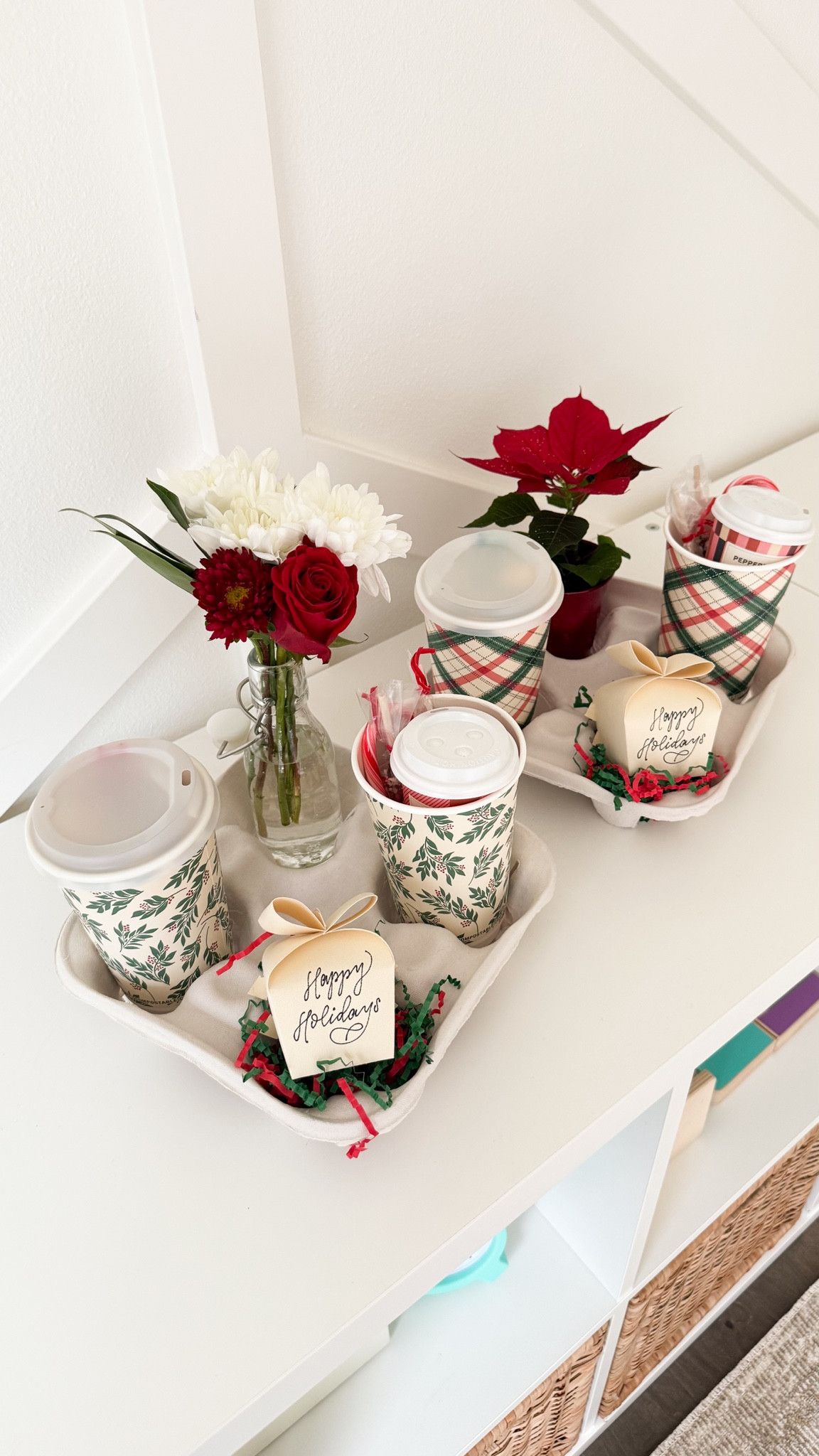 Last minute teachers gift idea using a drink carton carrier and filling it with hot cups, pens, holiday treats and chocolate, hot cocoa items, mini hot chocolate cups, flowers and cash! 

#LTKHome #LTKGiftGuide #LTKHoliday