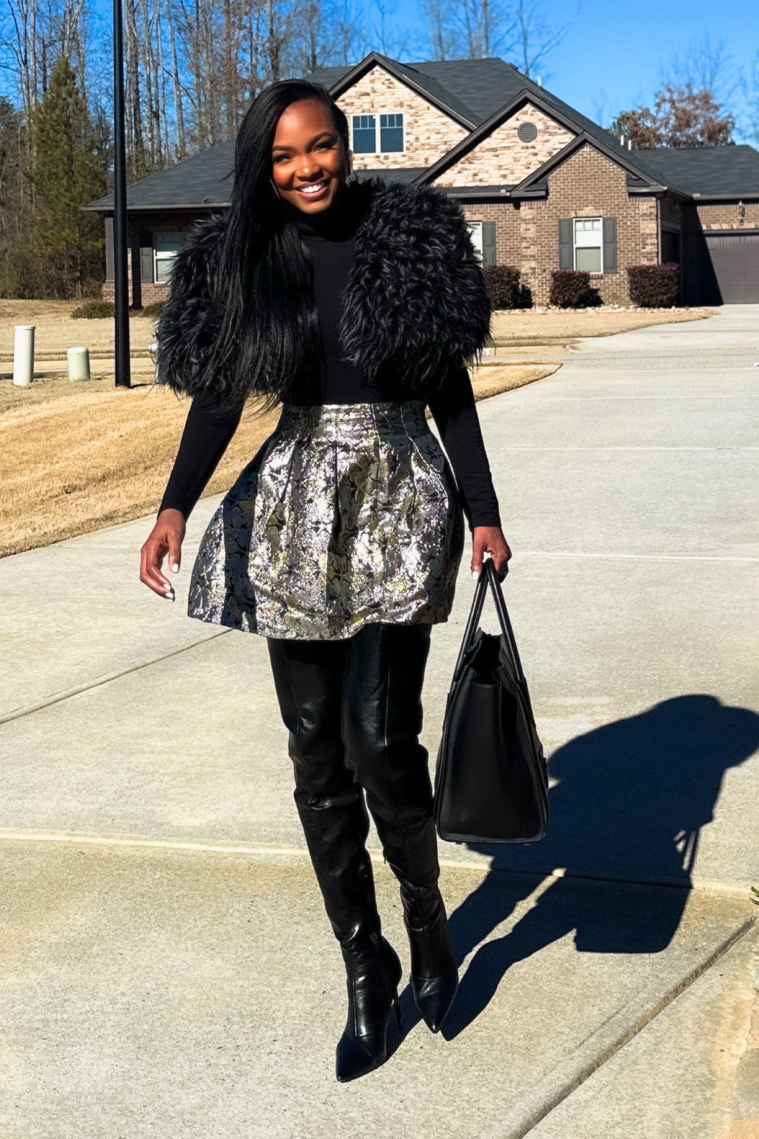 Fur : Zhivago
Skirt: Local Boutique
Bag : Celine 