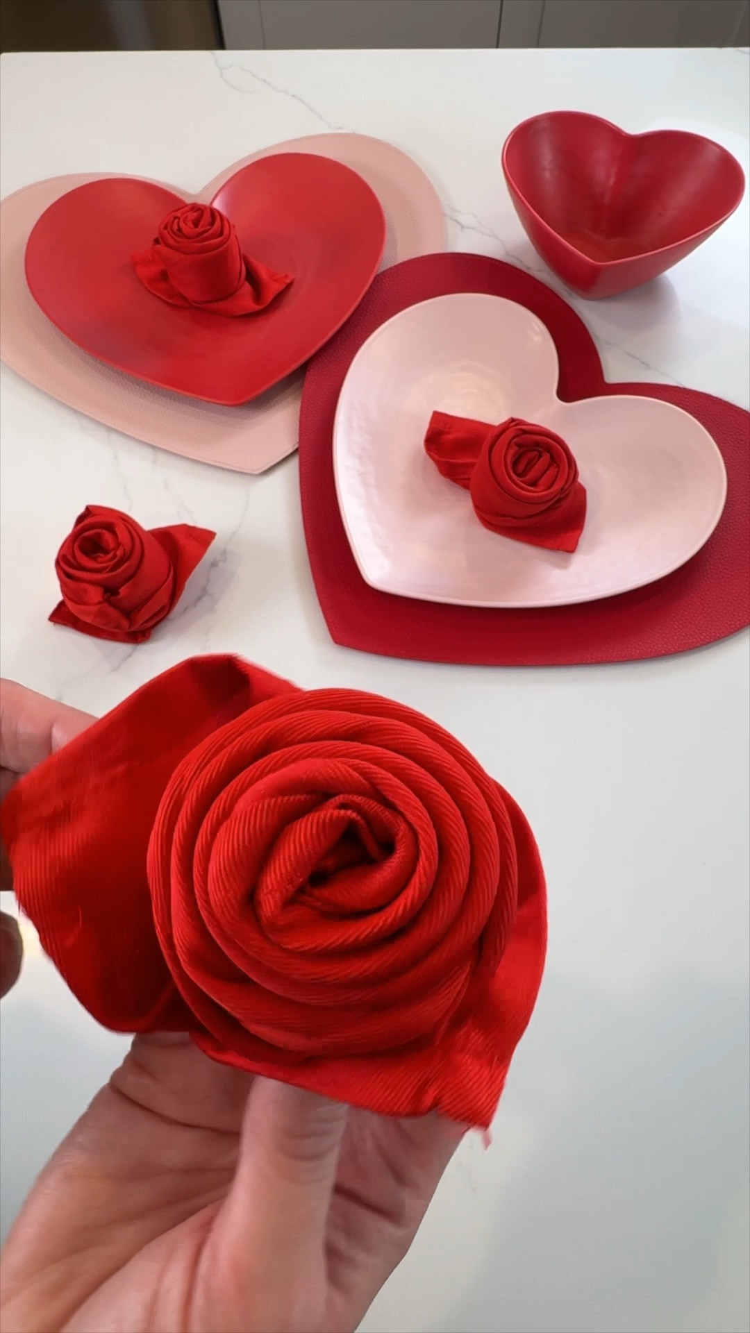 Save this and learn how to easily fold cloth napkins into gorgeous roses for Valentine’s Day!  🌹 ❤️ It takes less than a minute to do and is so simple.  The napkins paired beautifully with these place settings.  #valentinesdaytablescape #valentinesday2024 #valentinesdayideas

#LTKSeasonal #LTKfamily #LTKhome