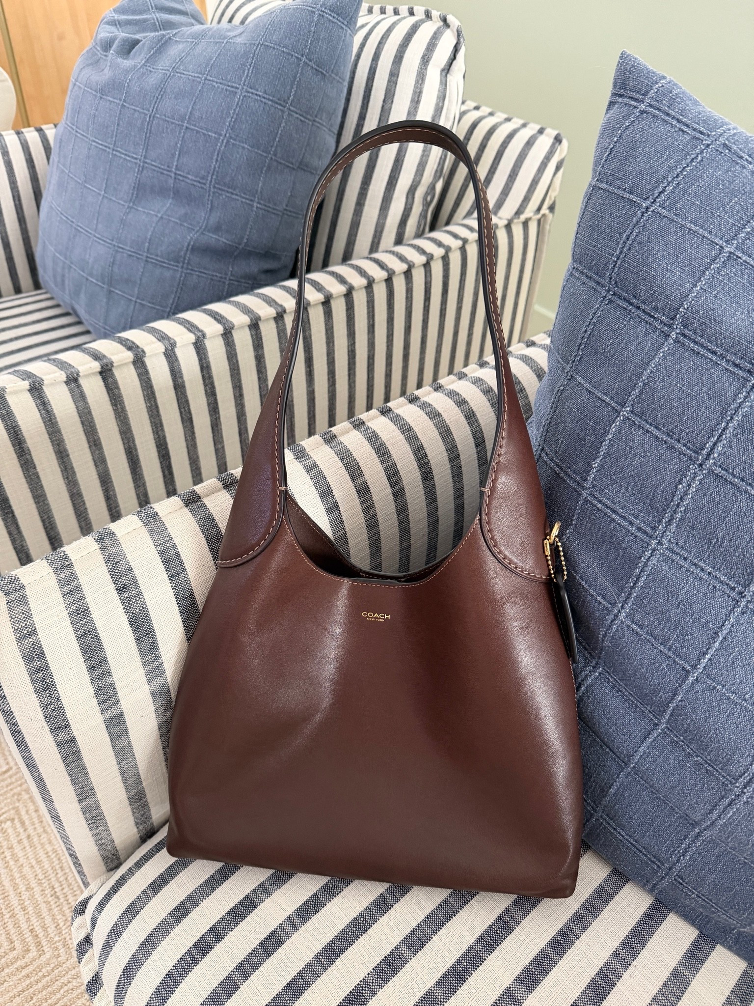 [7/13/26] love this new coach bag from @Shopbop | this is the Brooklyn shoulder bag 28, super elegant and minimalist! The leather is super soft which makes it collapsible and perfect for travel

#LTKTravel