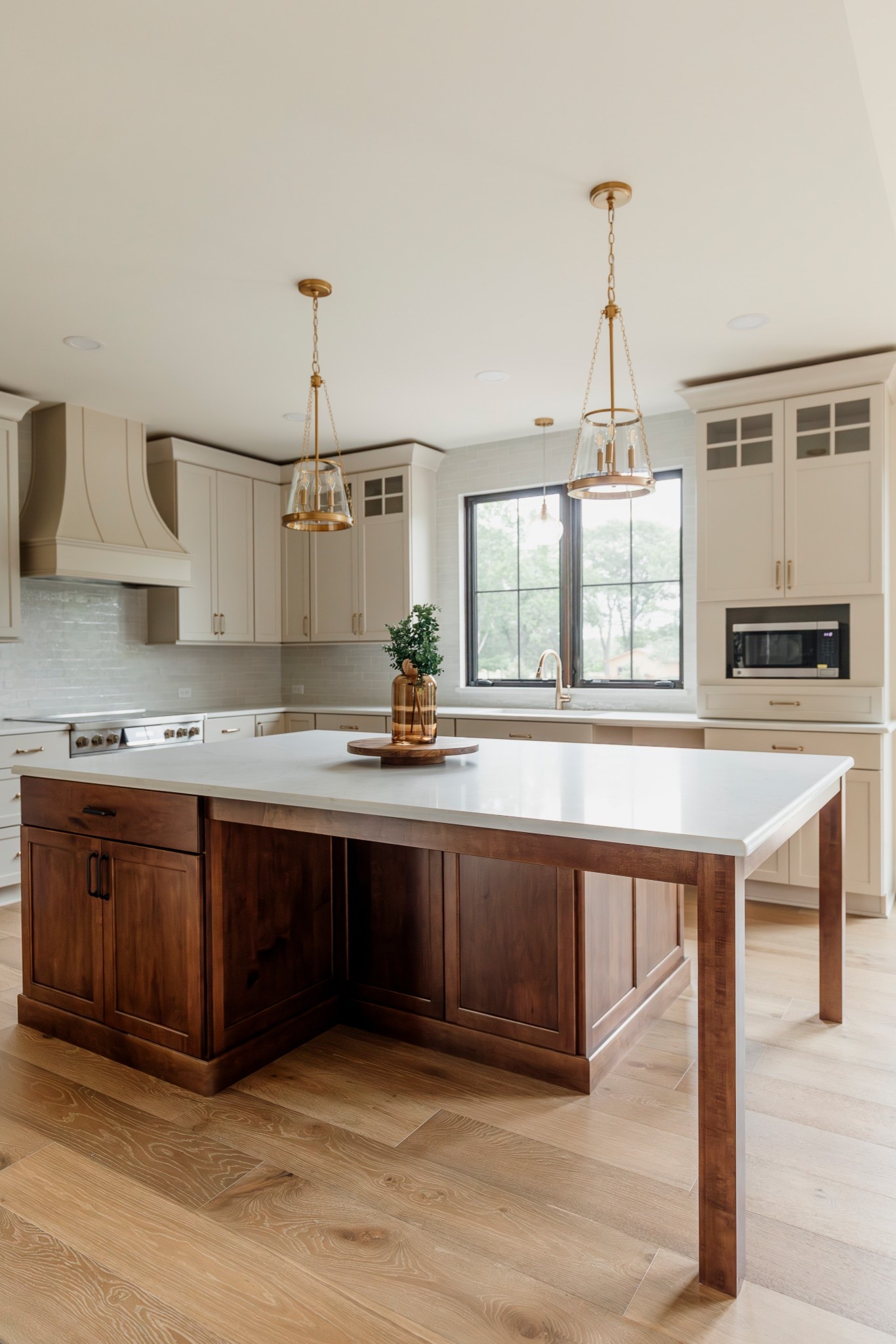 Gorgeous rubbed bronze island pendants! Love the subtle character and charm they add. 

#LTKHome #LTKFamily