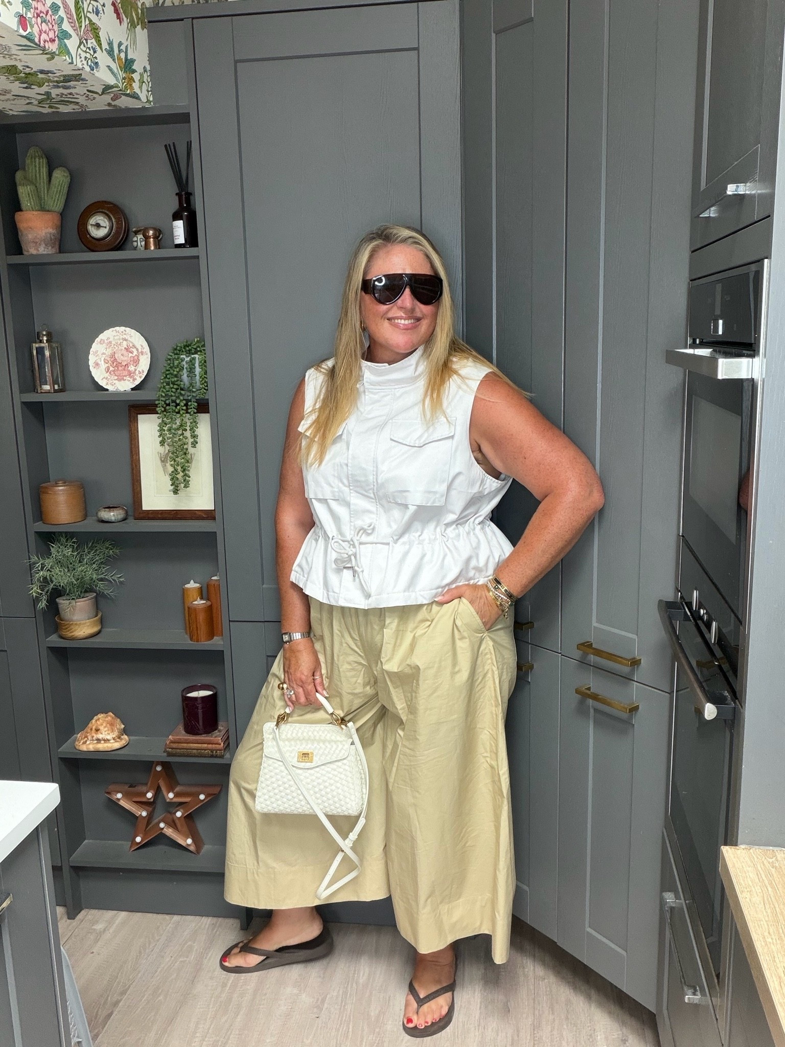 Cropped wide leg trousers, utility jacket, flip flops, brown sunglasses, woven bag

#LTKsummer #LTKplussize #LTKautumn