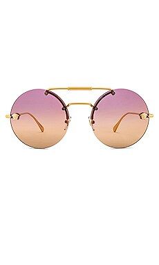 VERSACE Rock Icons Round in Gold & Clear Orange Fuchsia from Revolve.com | Revolve Clothing (Global)