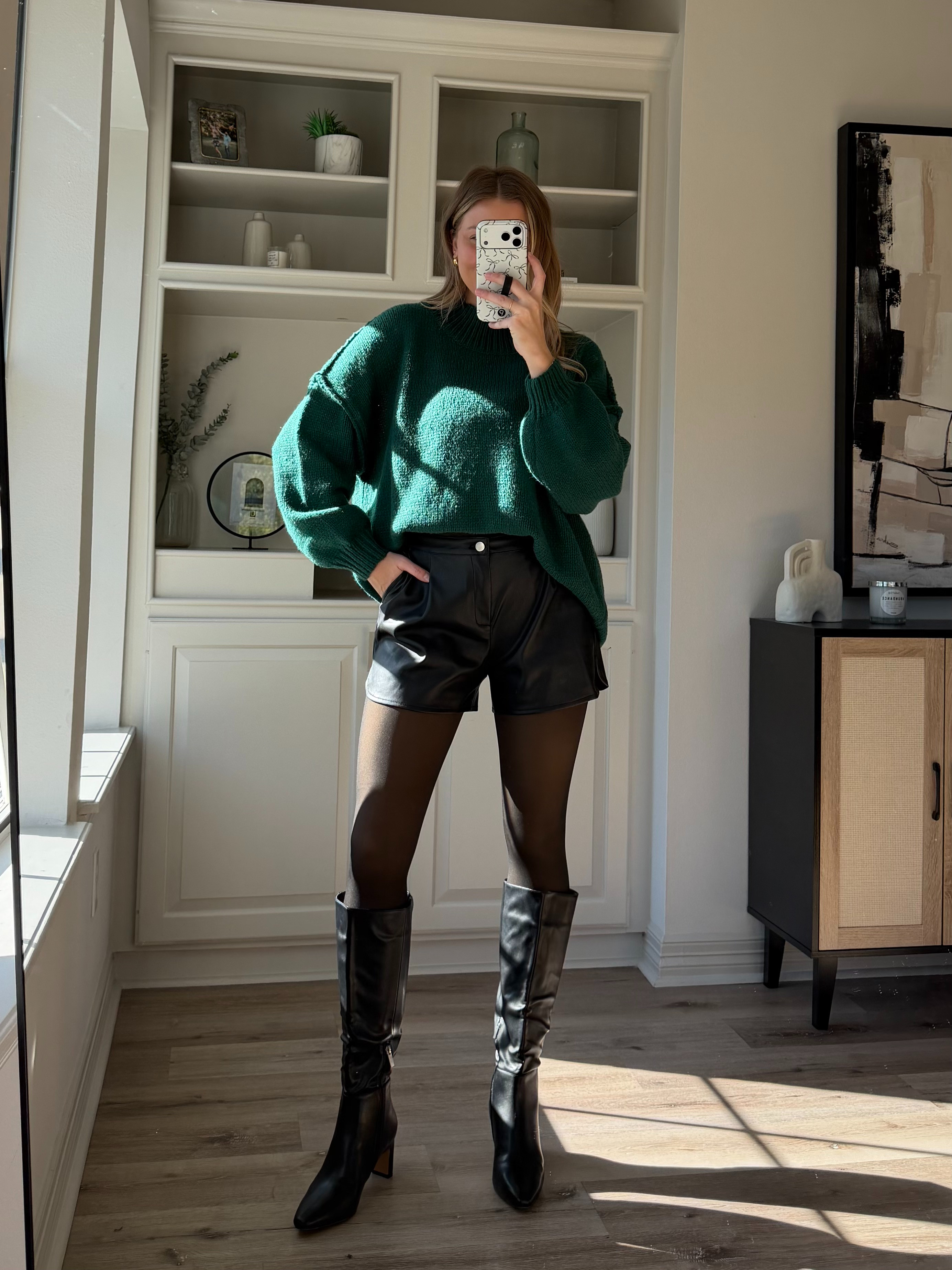 Holiday outfit inspo! Feeling so chic, but still comfy - shorts have elastic waist in the back! Wearing S in sweater + M in leather shorts. 

 #LTKHoliday #LTKootd #LTKFindsUnder100