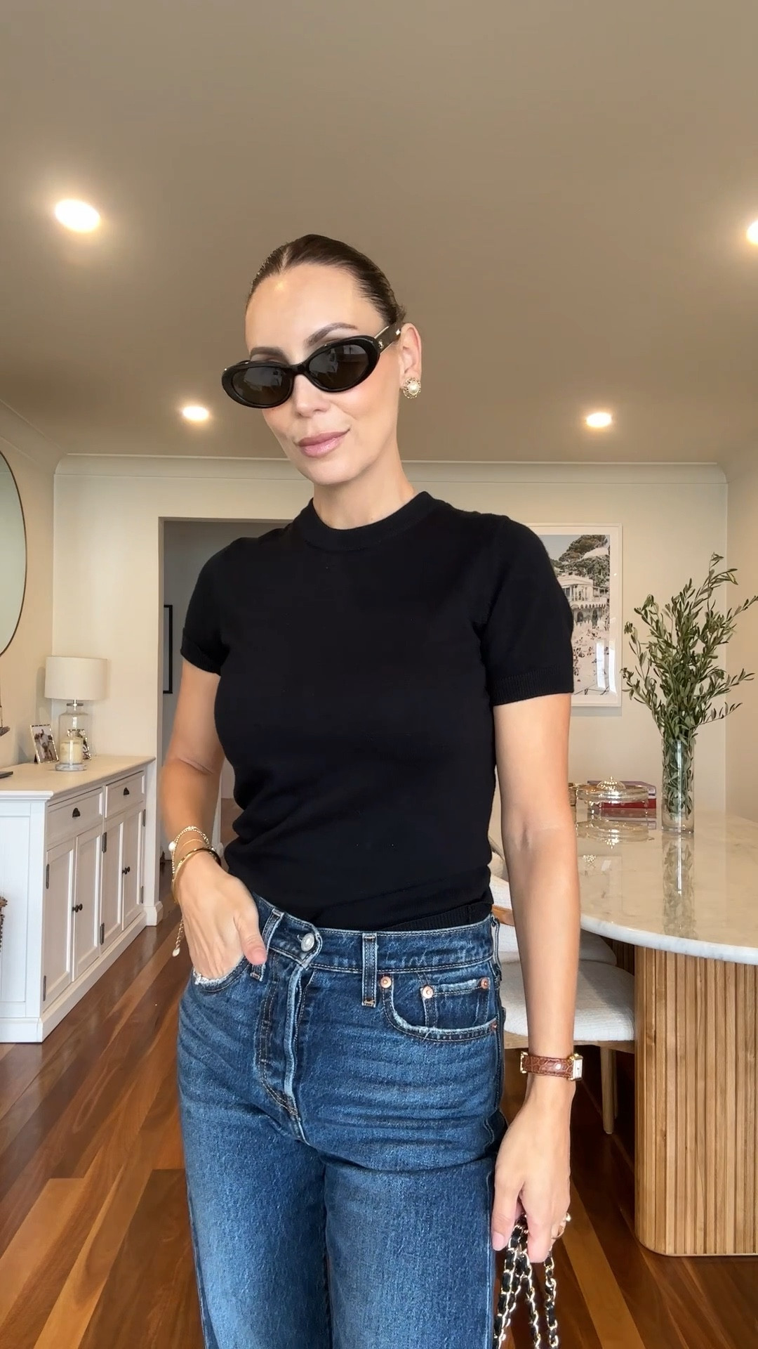 Classic Levi’s straight leg wedgie jeans and a black knit top 

#LTKsummer #LTKaustralia #LTKjeans