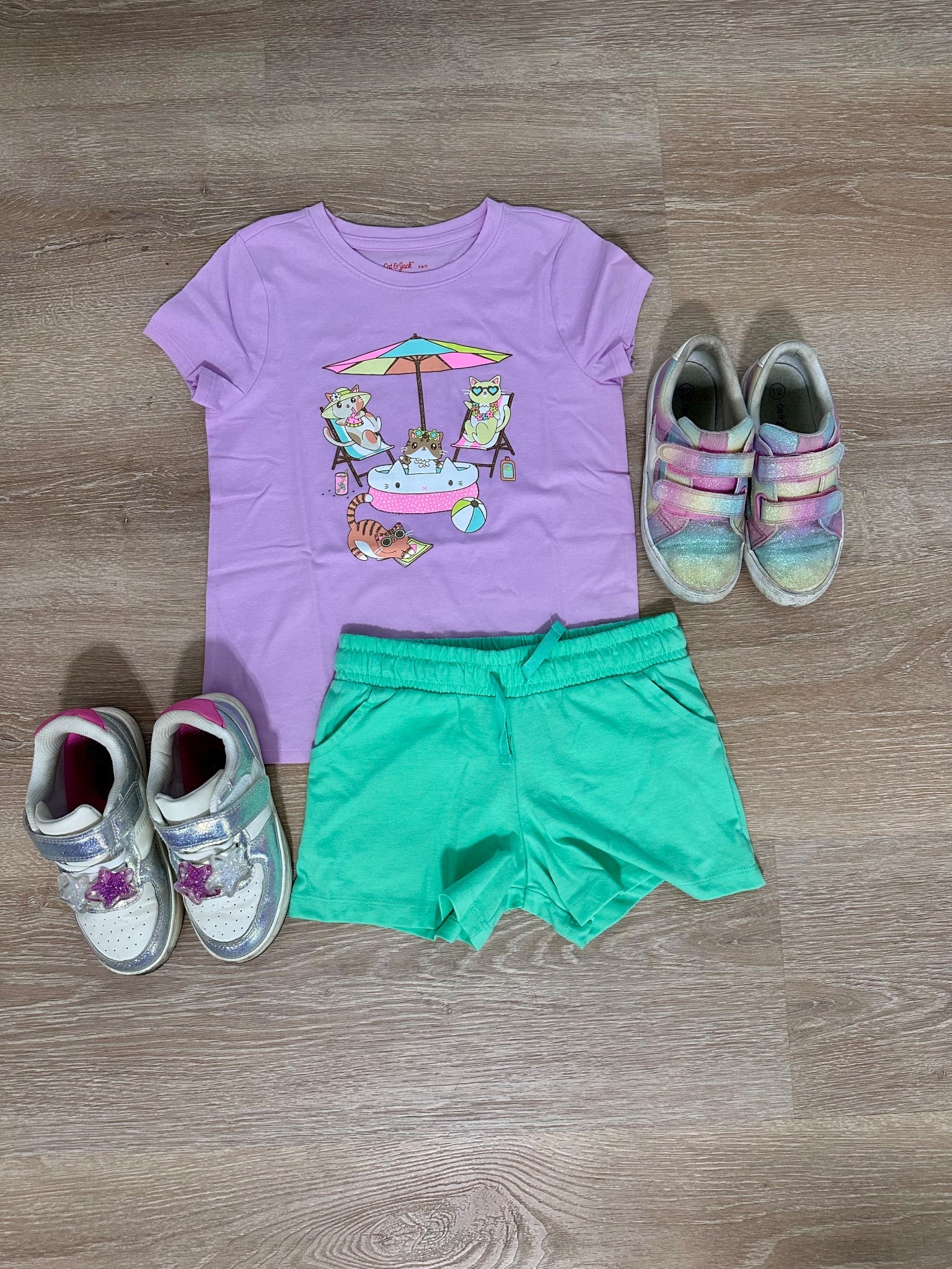 Bright, comfy, and playground-ready 🌈✨ This first grader’s outfit is giving all the summer-to-school vibes—light purple graphic tee, lime green shorts, and the choice between glitter or court sneakers for all-day fun. #LTKKids #BackToSchoolStyle #LTKFamily #PlaygroundReady

#LTKKids #LTKSaleAlert #LTKFindsUnder50