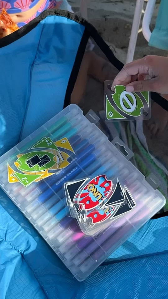 Gotta share this MVP of summer games: waterproof UNO playing cards! They come on a clip to keep the cards together and have been an absolute hit for brief shade-breaks when we are camped out at the beach or pool. Linked them below, best $7 I’ve spent all season! 

#LTKTravel #LTKFamily #LTKKids