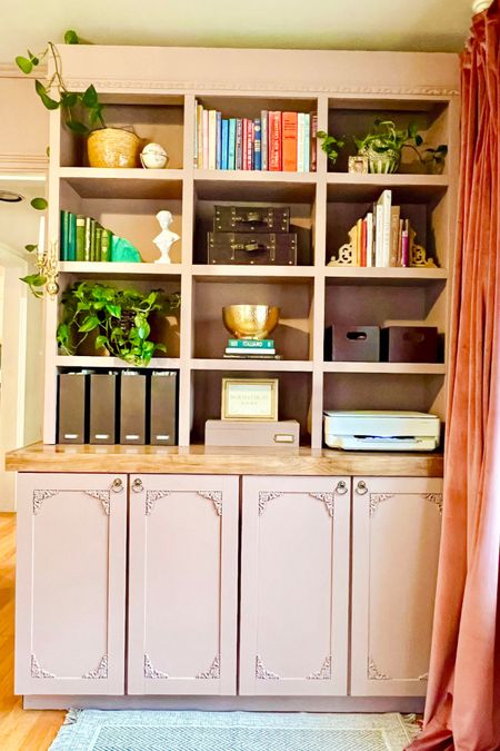 Cabinet build ins that I painted and then made my own with decor. A little love can completely change a space. 
Home DIY, Home decor, office space, office build ins 
#LTKHome #LTKMakeover

#LTKhome #LTKstyletip #LTKfindsunder50