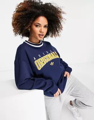 adidas Originals 'Retro Revival' logo graphics boyfriend fit sweatshirt in navy | ASOS | ASOS (Global)