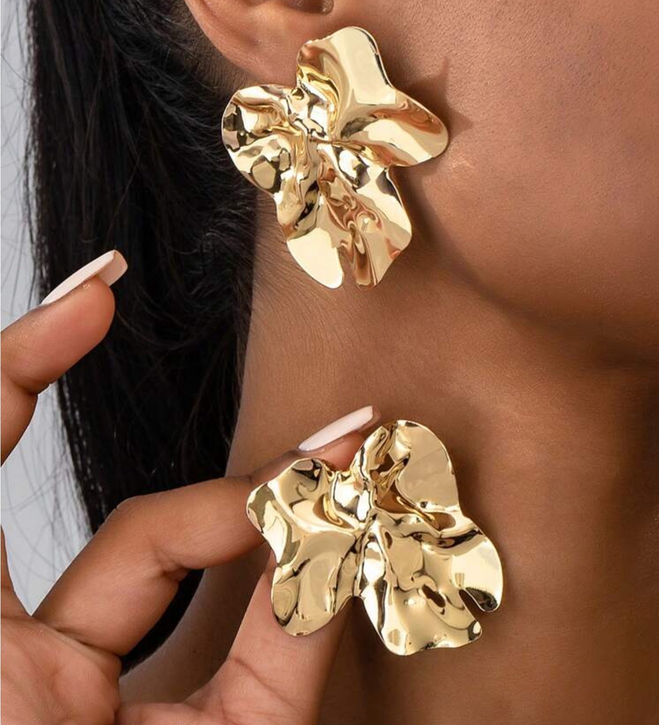 Gold semetric flower earring   

#LTKGiftGuide #LTKU #LTKStyleTip