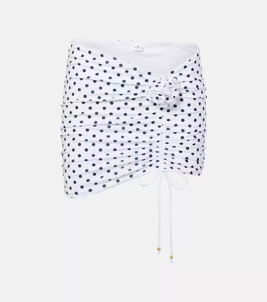 Bananhot Stefani polka-dot ruched miniskirt | Mytheresa (US/CA)