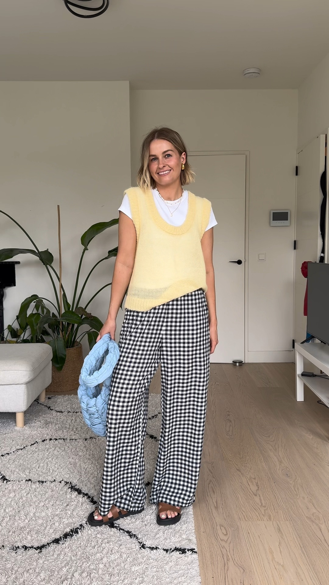 Summer office outfit! I’m wearing a M in the gingham trousers. Yellow vest is from Ruby NZ and blue bag is old from COS

#LTKuk #LTKeurope #LTKsummer