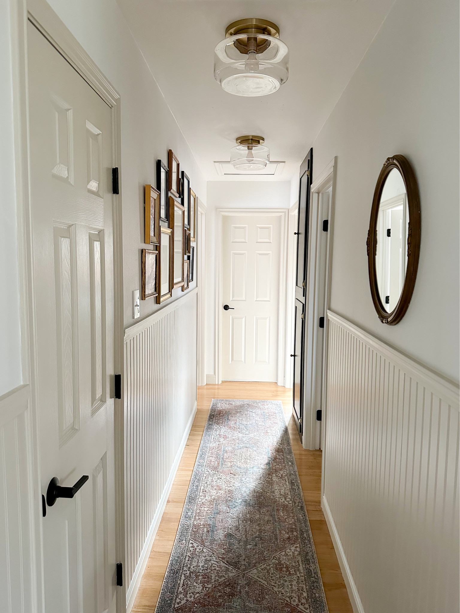 Hallway sources! Cozy rug, semi flush brass light fixtures

#LTKhome